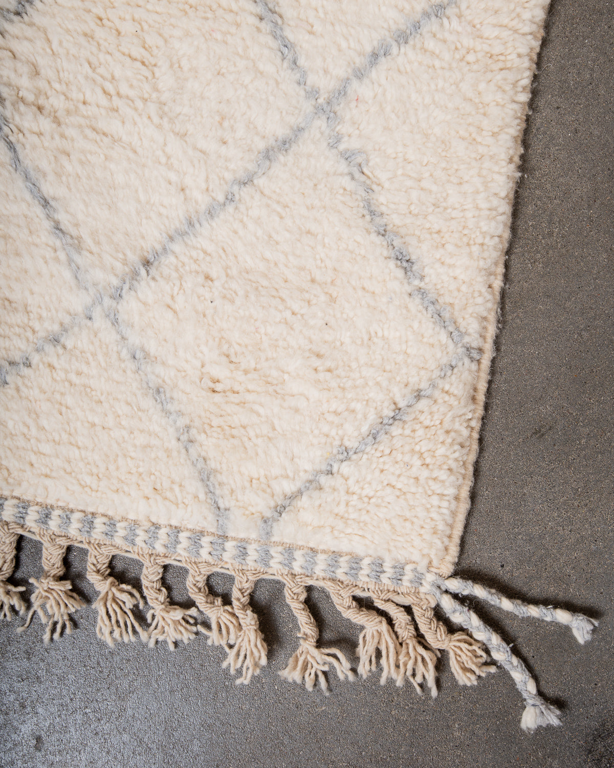 Modern, designer, handcrafted Berber rug from Morocco. Beniourain carpet with beautiful colours and patterns and fluffy wool texture.